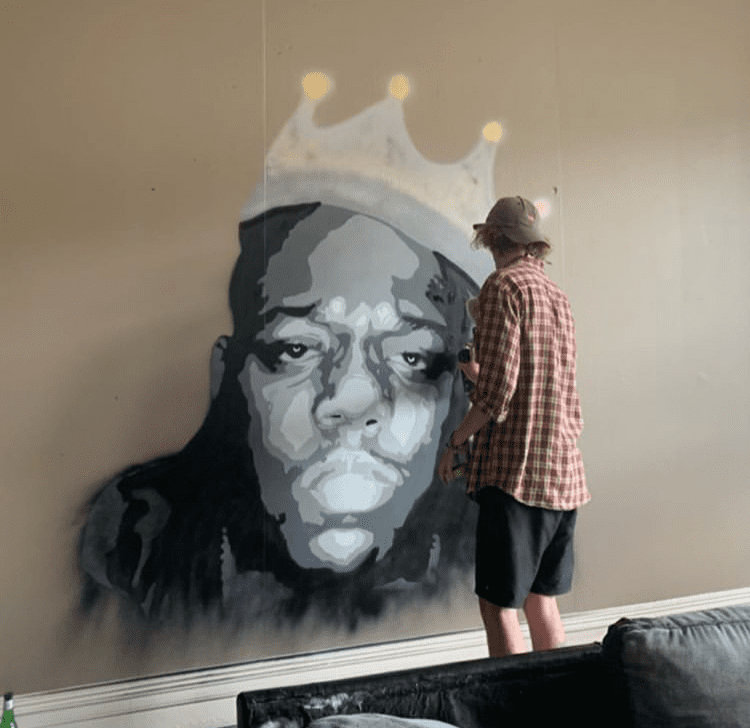 Jacob Root painting Biggie Smalls at a private residence, 2018