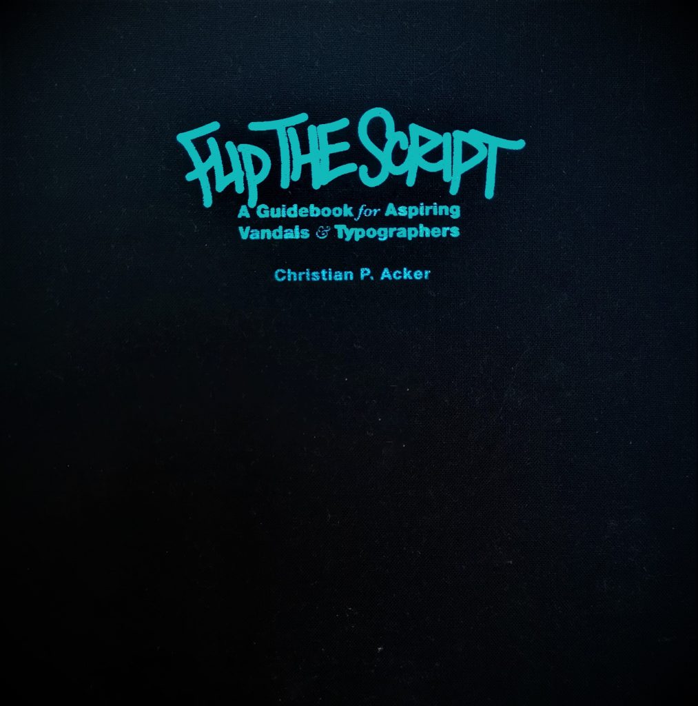 The black cover of the book Flip the Script with the title in blue