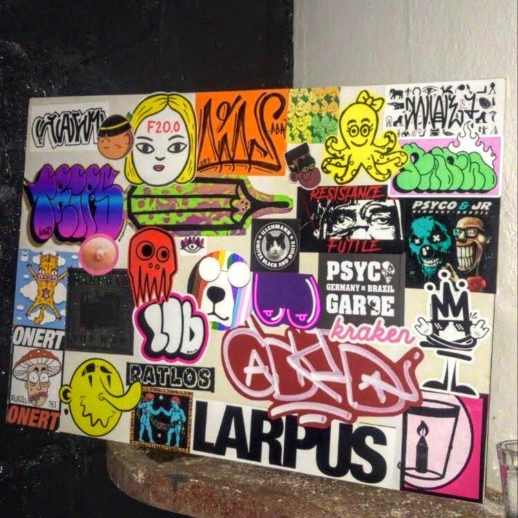 A board covered in stickers in Brazil
