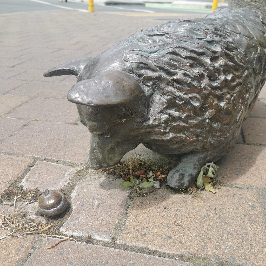 Mike Beer's playful addition of 'bronze' dog shit to the long-standing corgi sculptures on High Street